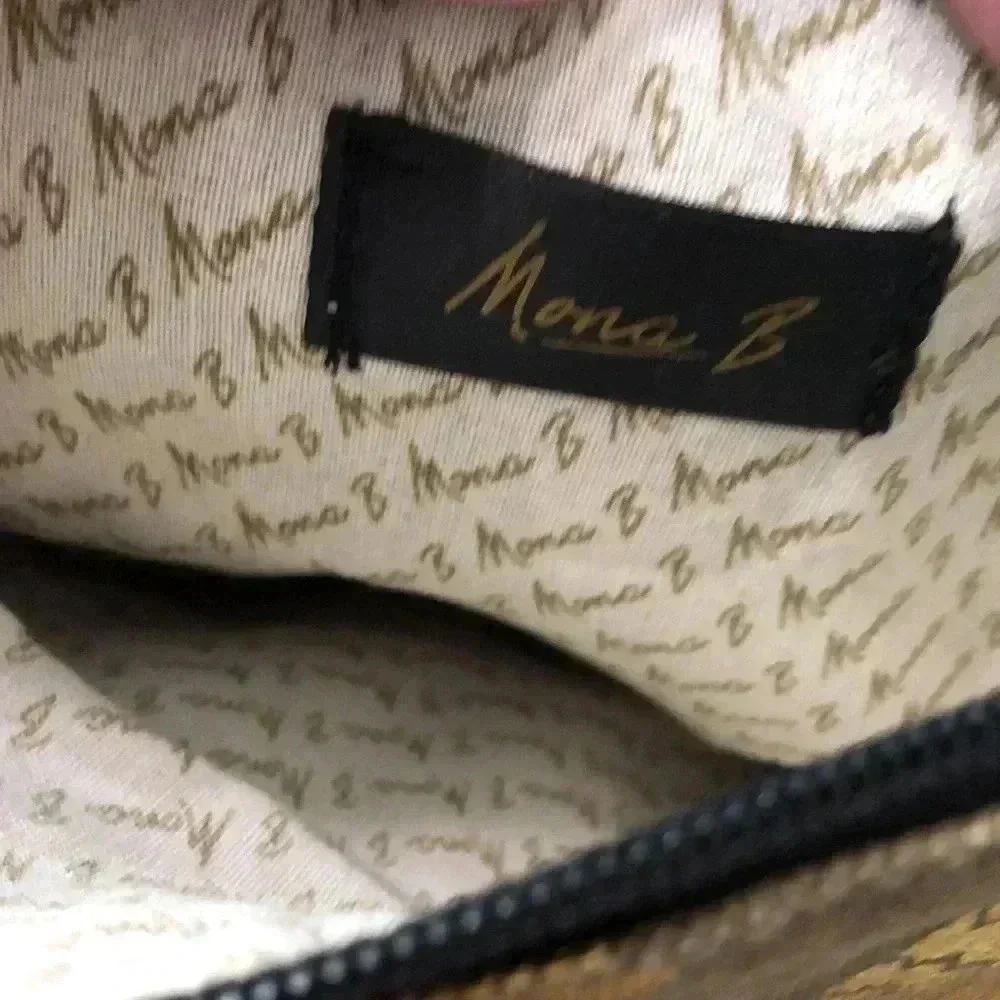 Mona B. Fold over crossbody bag. Tan/gold design.